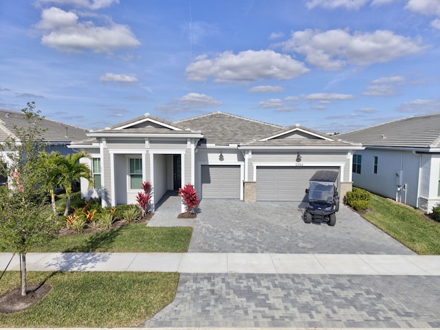 single story home featuring a garage