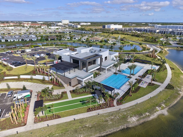 bird's eye view with a water view