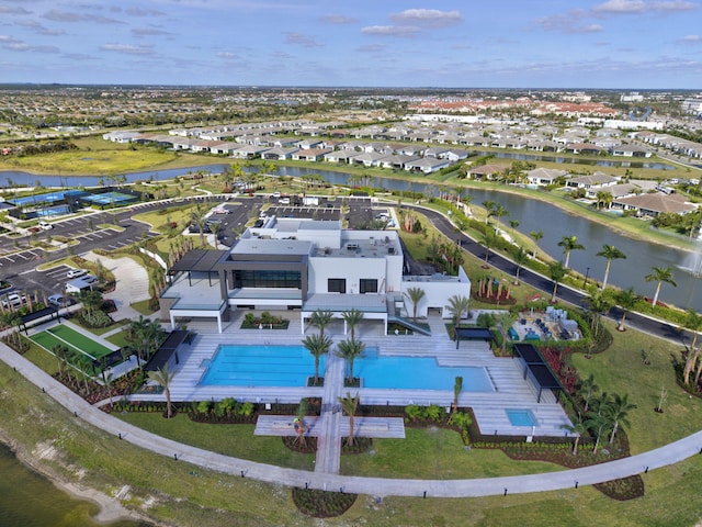 drone / aerial view with a water view