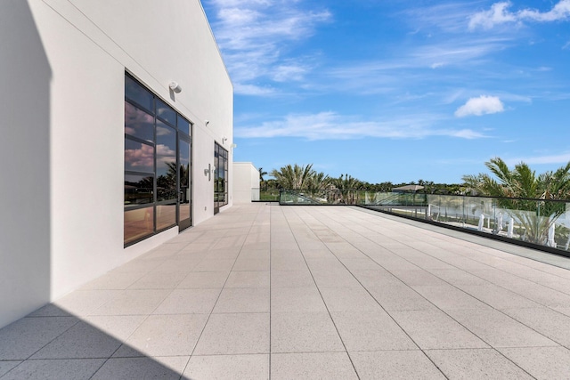 view of patio / terrace featuring a water view