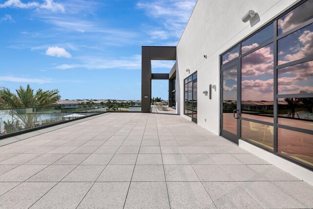 view of patio featuring a water view