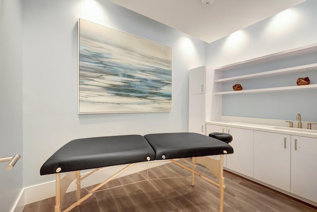 interior space featuring sink and light hardwood / wood-style flooring