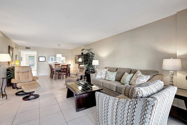 living room featuring light tile patterned floors