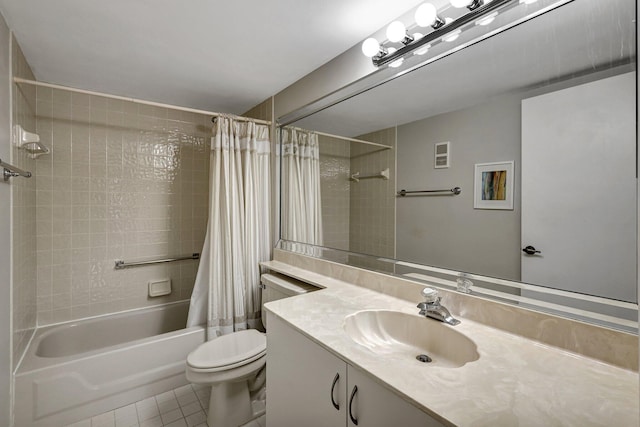 full bathroom with toilet, shower / bath combo, vanity, and tile patterned floors