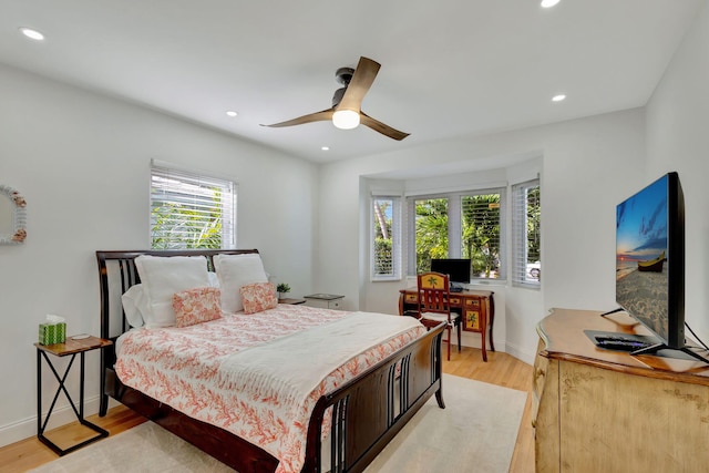 bedroom with ceiling fan, baseboards, light wood-style floors, and recessed lighting