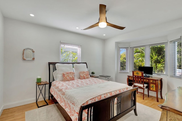 bedroom with recessed lighting, light wood-style flooring, baseboards, and ceiling fan