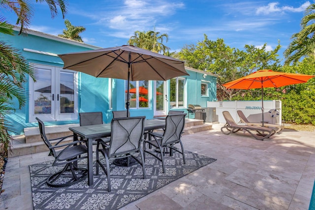 view of patio featuring area for grilling and french doors