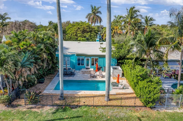 view of pool featuring a patio