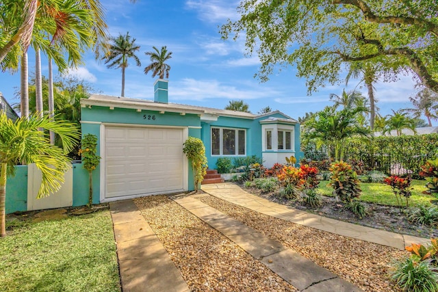 single story home with a garage