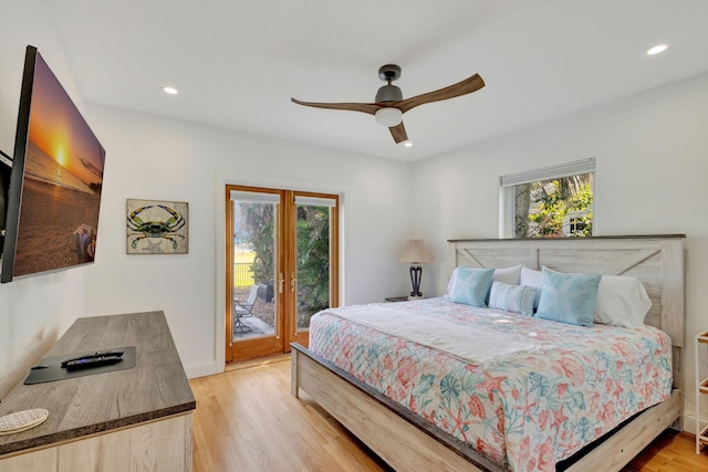 bedroom with french doors, access to outside, light hardwood / wood-style flooring, and ceiling fan