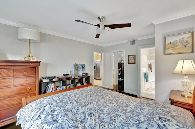 bedroom featuring ceiling fan, a closet, ornamental molding, and ensuite bath