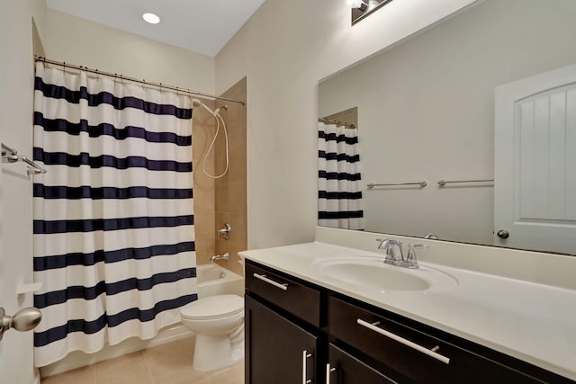 full bathroom with tile patterned floors, vanity, shower / bath combination with curtain, and toilet