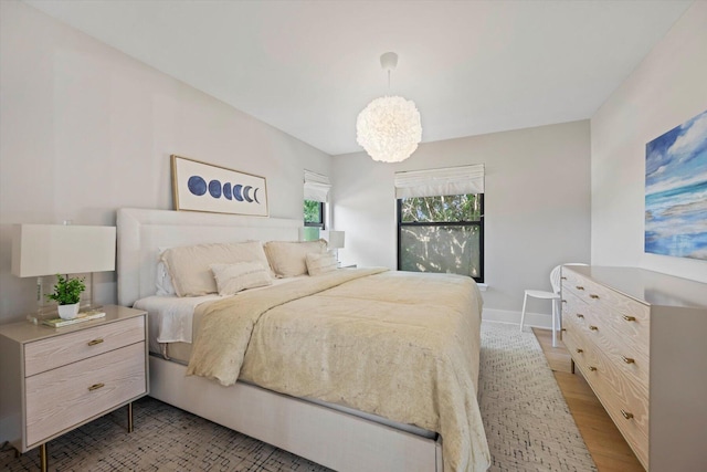 bedroom featuring light hardwood / wood-style floors