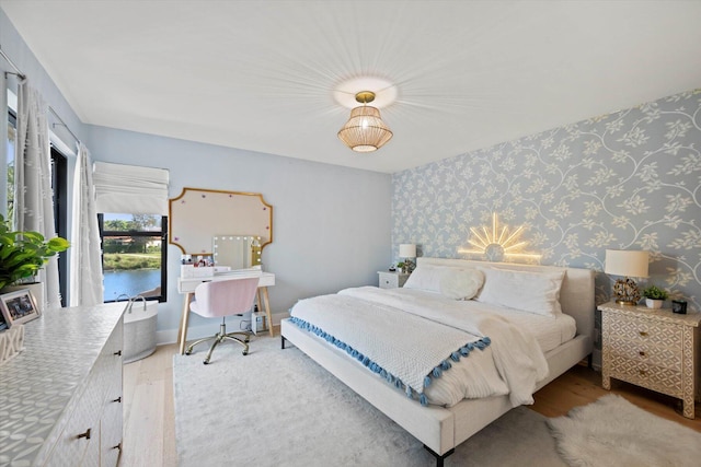 bedroom featuring wood-type flooring