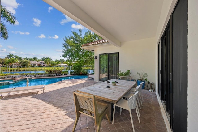 view of swimming pool with a patio area