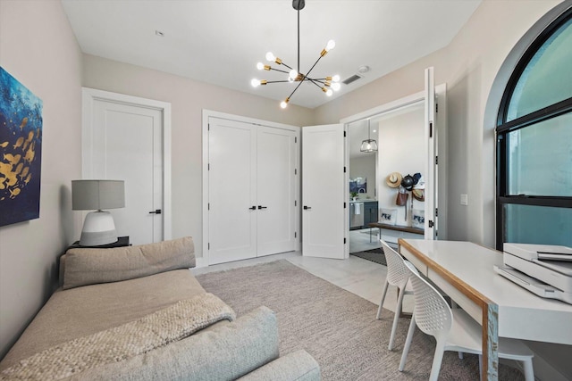 office area with a chandelier