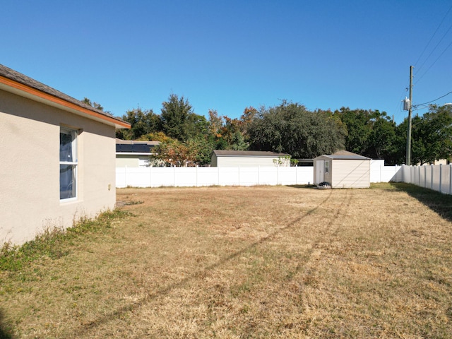 view of yard with a shed