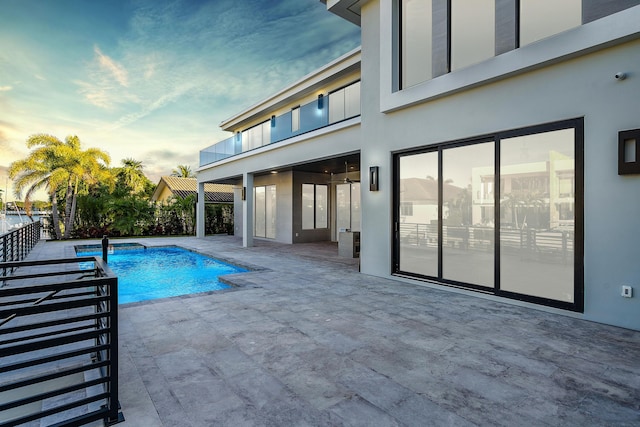 outdoor pool featuring a patio area