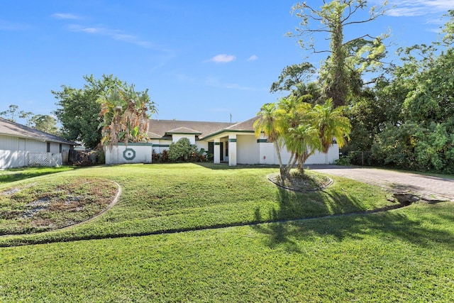 view of front facade with a front lawn