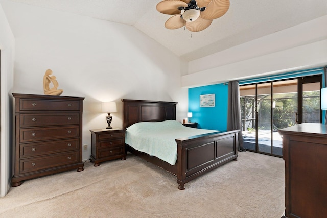 carpeted bedroom featuring ceiling fan, access to exterior, and vaulted ceiling