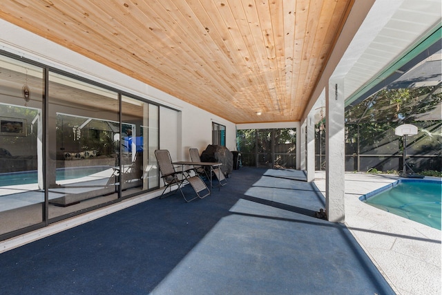 view of patio featuring a fenced in pool