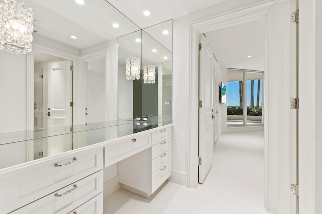 bathroom featuring vanity, toilet, and walk in shower