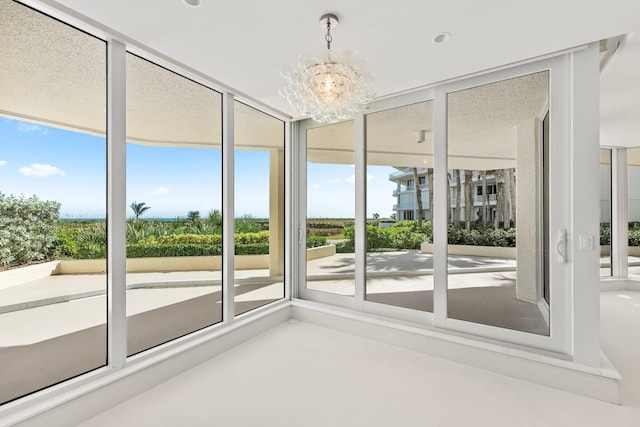 interior space featuring a chandelier