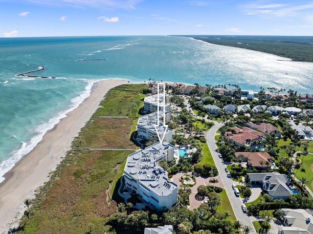 bird's eye view with a water view and a view of the beach