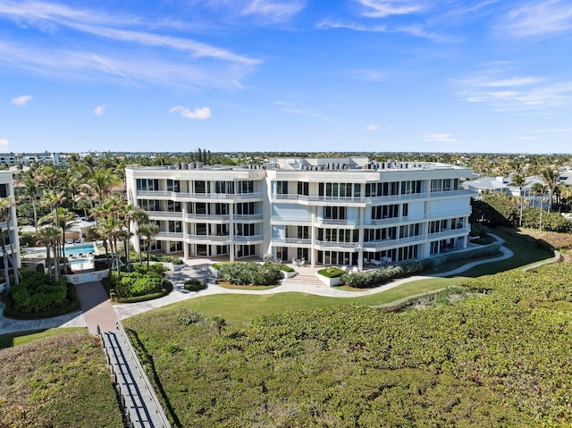 drone / aerial view with a view of the beach and a water view