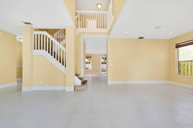 entrance foyer with light tile patterned floors