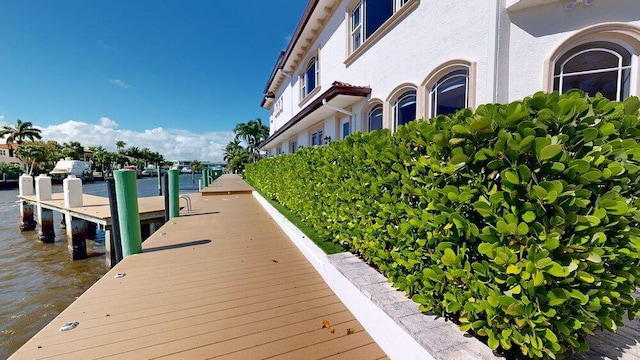 dock area featuring a water view