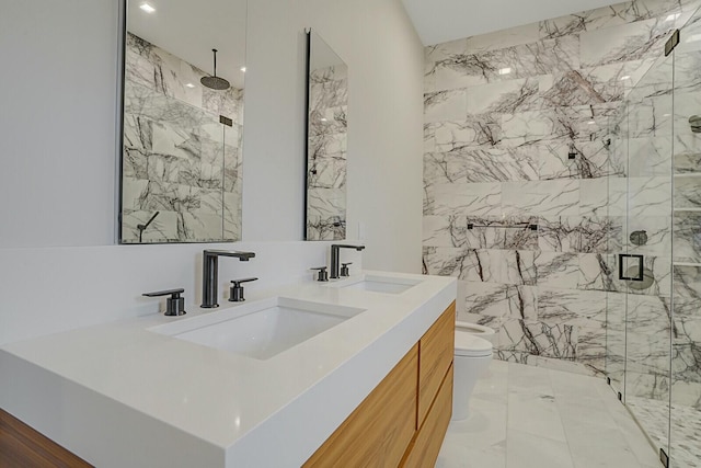 bathroom featuring walk in shower, vanity, and toilet