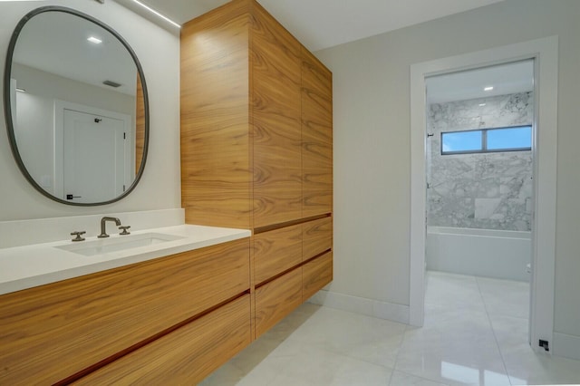 bathroom with vanity and tile patterned floors