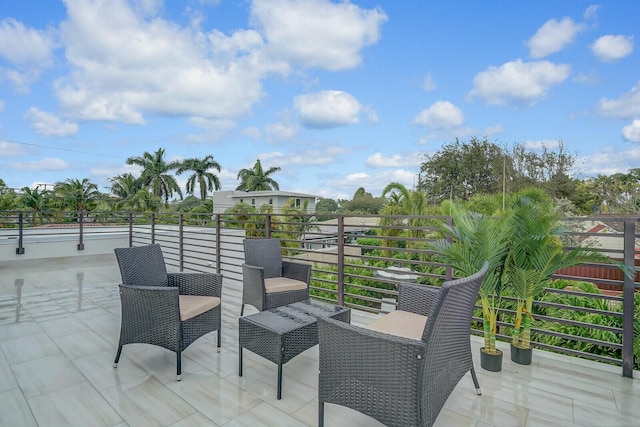 view of patio / terrace with a balcony