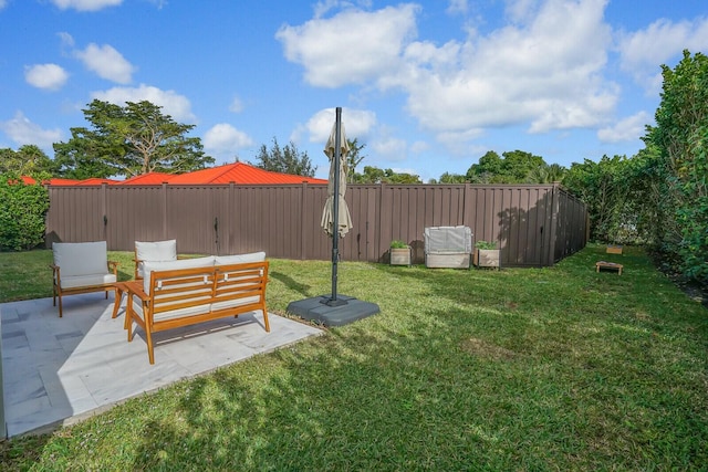 view of yard featuring a patio area and an outdoor hangout area