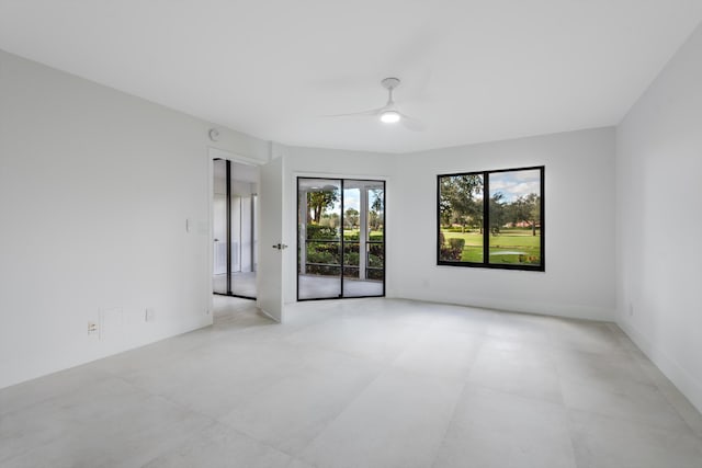 spare room with ceiling fan