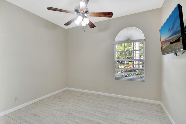 unfurnished room with ceiling fan and light hardwood / wood-style floors