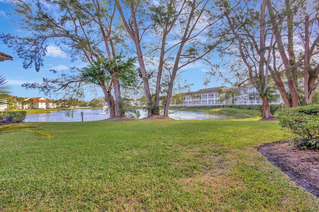 view of yard with a water view