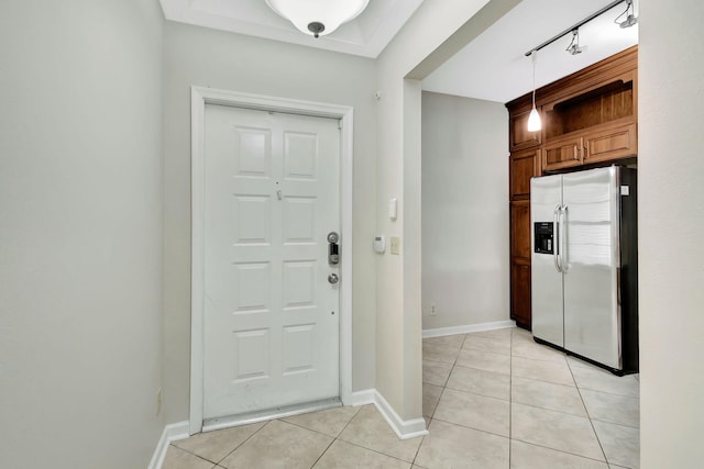 view of tiled foyer entrance