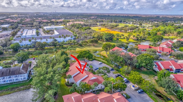 birds eye view of property featuring a water view