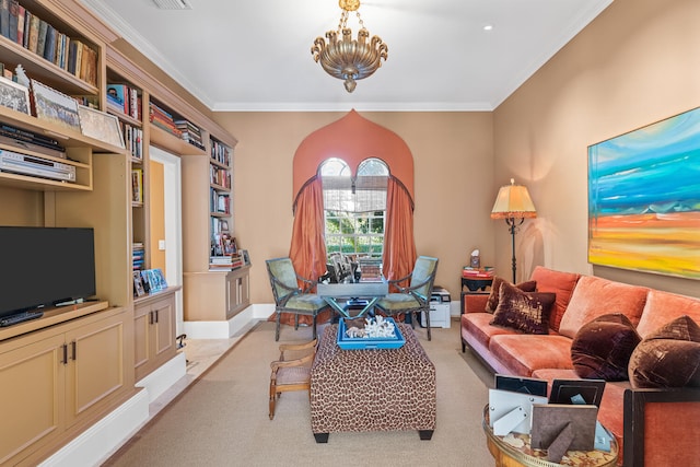 carpeted living room with crown molding and an inviting chandelier