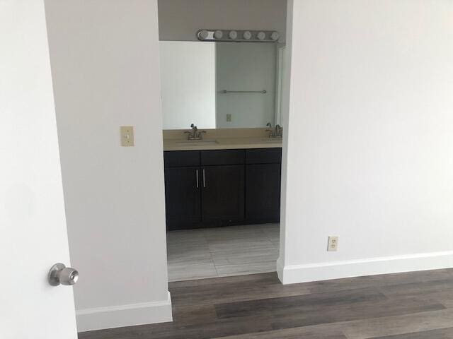 7630 Lago Del Mar Dr Unit 1, Boca Raton, FL 33433 - hall featuring baseboards and wood finished floors