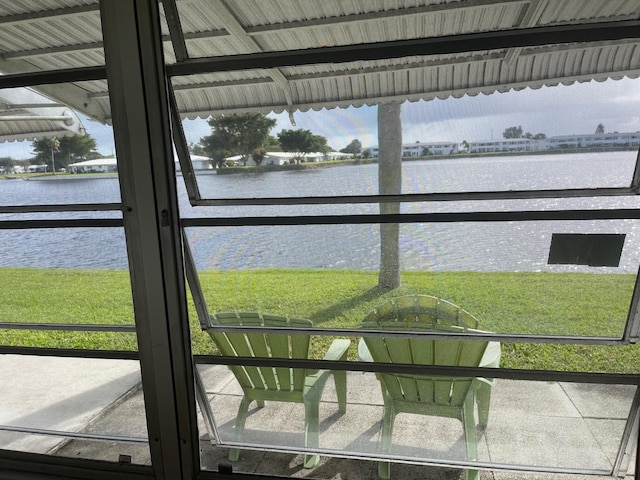 sunroom with a water view