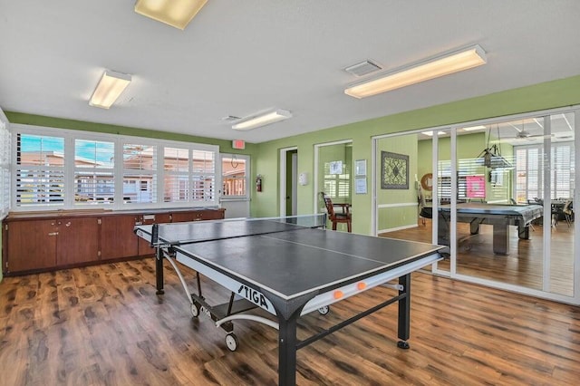 rec room with ceiling fan, pool table, and hardwood / wood-style flooring