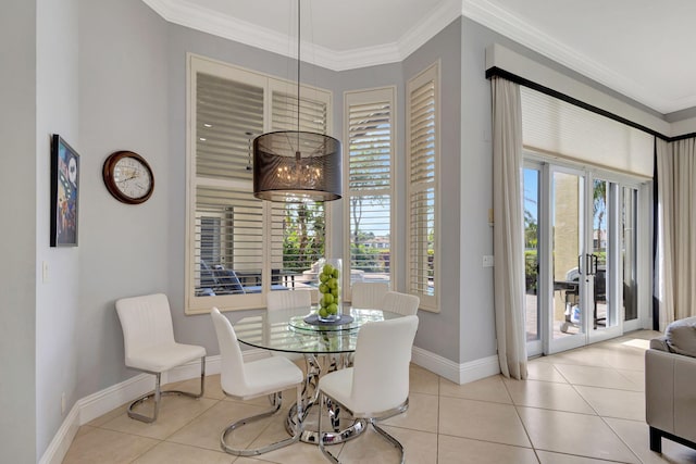 dining area featuring a healthy amount of sunlight, light tile patterned floors, and ornamental molding