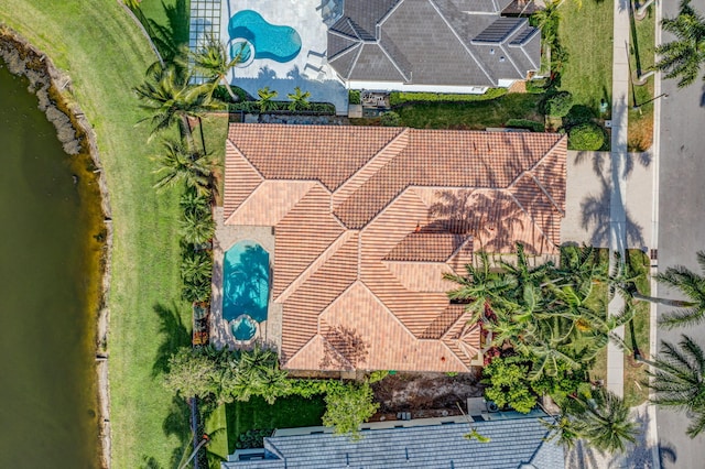 drone / aerial view with a water view