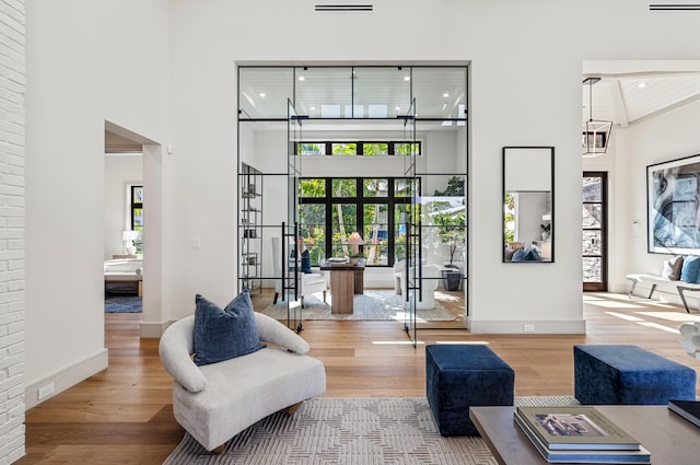 321 NW 7th St, Delray Beach, FL 33444 - building lobby featuring a towering ceiling and recessed lighting
