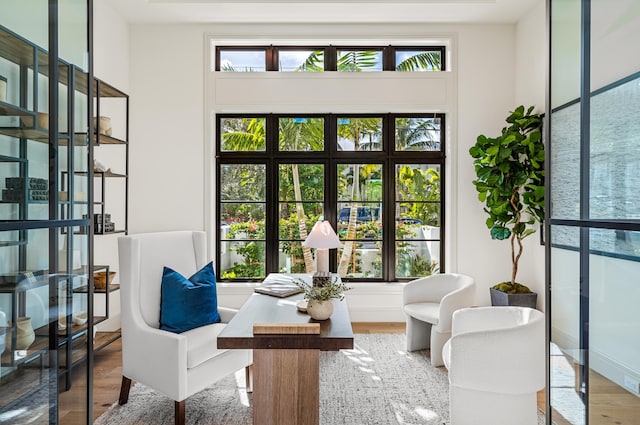 321 NW 7th St, Delray Beach, FL 33444 - living area with plenty of natural light and wood finished floors