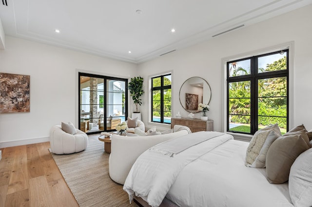 321 NW 7th St, Delray Beach, FL 33444 - bedroom featuring light wood-style flooring, access to outside, and recessed lighting
