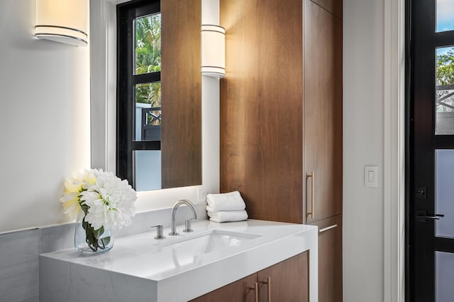 321 NW 7th St, Delray Beach, FL 33444 - bathroom featuring vanity and healthy amount of natural light